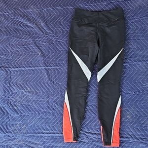 Athletic Black Leggings with orange and White Accents